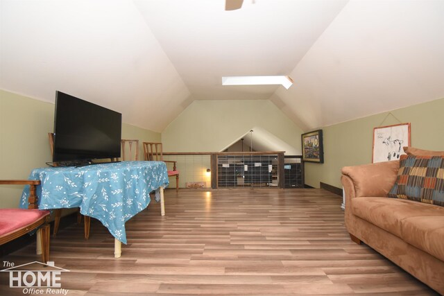 2411 Escott Rd, Owosso, MI 48867 - living room with wood finished floors and vaulted ceiling