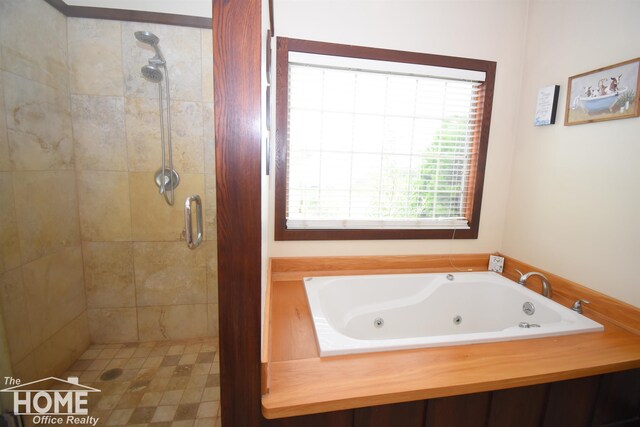 2411 Escott Rd, Owosso, MI 48867 - full bath featuring a stall shower and a whirlpool tub