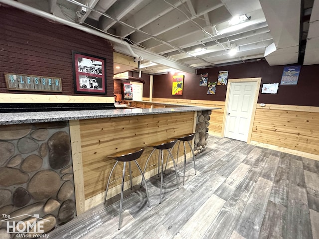2411 Escott Rd, Owosso, MI 48867 - indoor dry bar with wood finished floors and wood walls