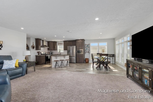 5231 E Scenic Turn Ln, Holland, MI 49423 - living area with recessed lighting, a textured ceiling, and light wood finished floors
