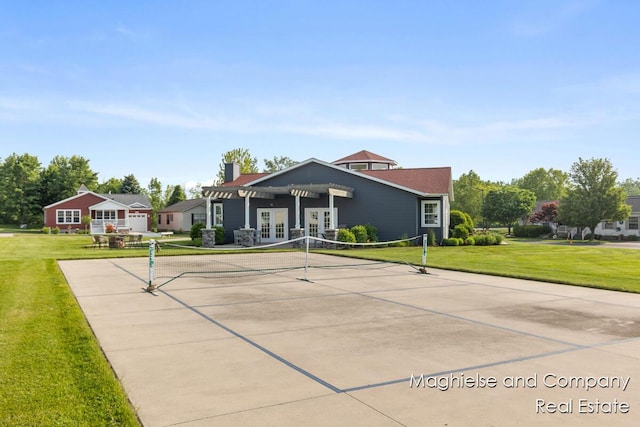 5231 E Scenic Turn Ln, Holland, MI 49423 - view of front facade with french doors, a front lawn, volleyball court, and a chimney