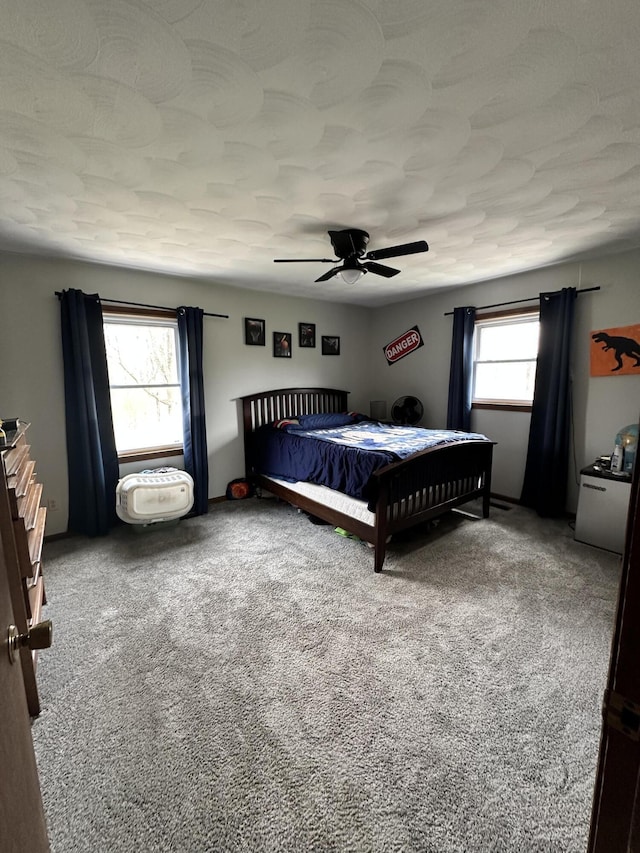 11199 Edgewood Rd, Bellevue, MI 49021 - carpeted bedroom featuring a ceiling fan