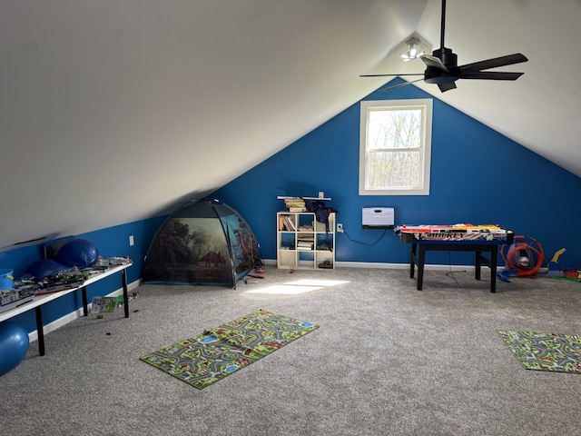 11199 Edgewood Rd, Bellevue, MI 49021 - playroom featuring a ceiling fan, carpet floors, and lofted ceiling