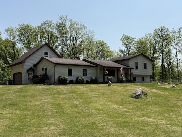 11199 Edgewood Rd, Bellevue, MI 49021 - view of front of house featuring an attached garage
