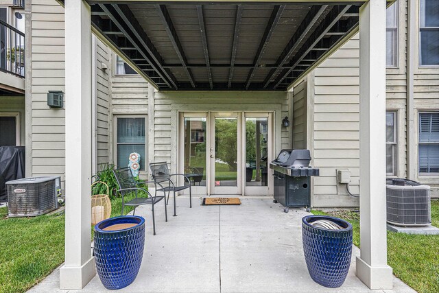 3395 Breckland Ct, Ann Arbor, MI 48108 - view of patio featuring french doors and a grill