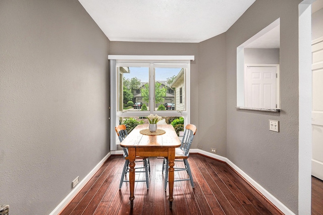 3395 Breckland Ct, Ann Arbor, MI 48108 - dining space with dark wood-type flooring and a textured wall