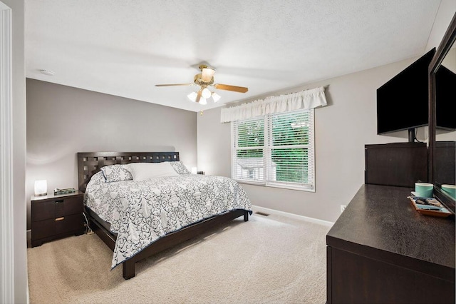 3999 Ravina Ter, Saint Joseph, MI 49085 - carpeted bedroom with baseboards and a ceiling fan