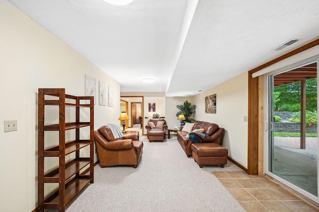 3999 Ravina Ter, Saint Joseph, MI 49085 - living room with light colored carpet and light tile patterned floors