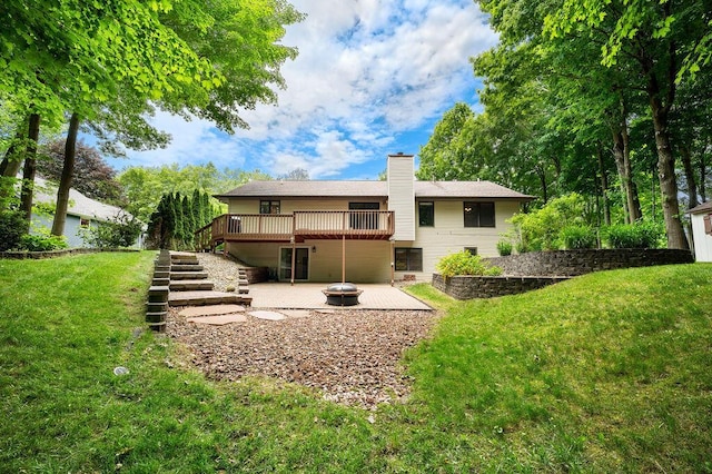 3999 Ravina Ter, Saint Joseph, MI 49085 - rear view of property featuring a patio area, a wooden deck, stairs, a lawn, and a chimney
