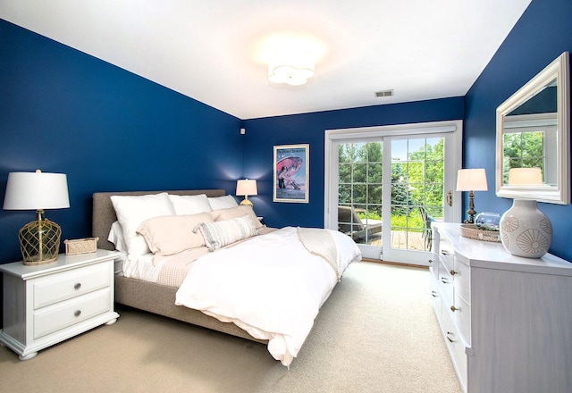 18418 Dunecrest Dr Unit 9, New Buffalo, MI 49117 - bedroom featuring access to outside and light carpet