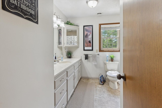 10343 N Walnut Ave, Bitely, MI 49309 - bathroom with vanity and toilet