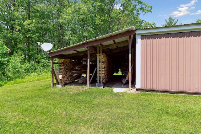 10343 N Walnut Ave, Bitely, MI 49309 - view of pole building with a lawn