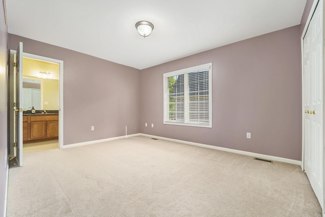 2032 Cameo Ct, Canton, MI 48187 - unfurnished bedroom with light colored carpet, a closet, and ensuite bathroom