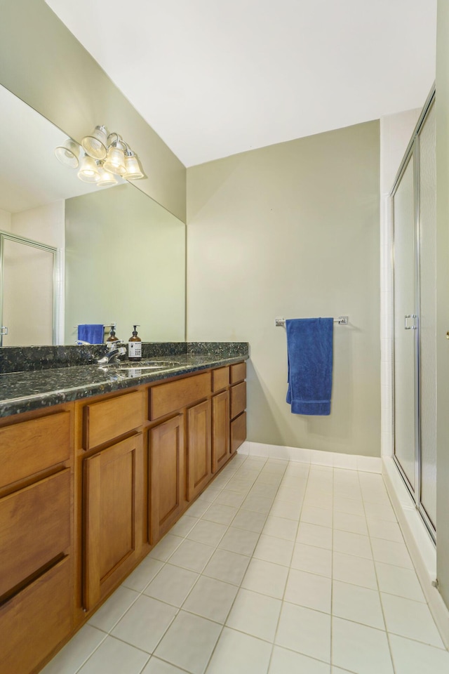 2032 Cameo Ct, Canton, MI 48187 - bathroom with vanity, a shower stall, and tile patterned flooring