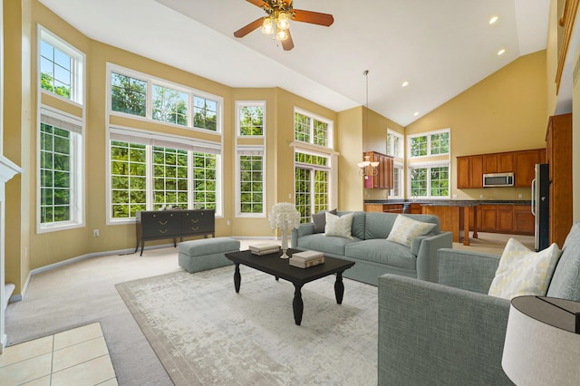 2032 Cameo Ct, Canton, MI 48187 - living area with high vaulted ceiling, healthy amount of natural light, light colored carpet, recessed lighting, and a ceiling fan