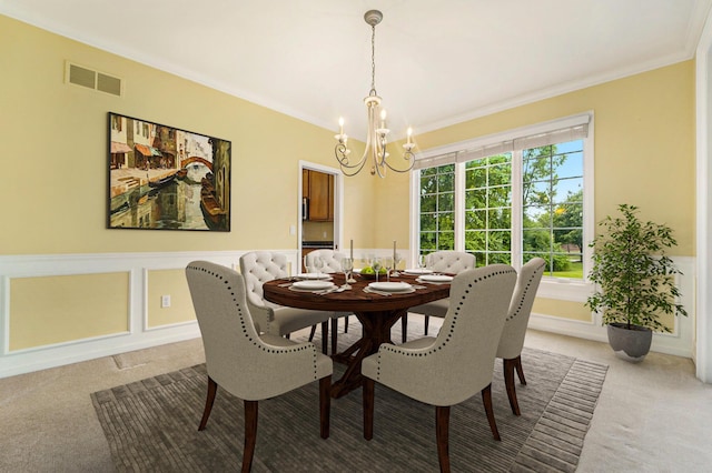 2032 Cameo Ct, Canton, MI 48187 - dining room featuring light carpet, a chandelier, and crown molding