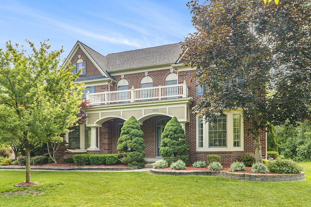 2032 Cameo Ct, Canton, MI 48187 - colonial inspired home with a balcony, brick siding, and a front lawn