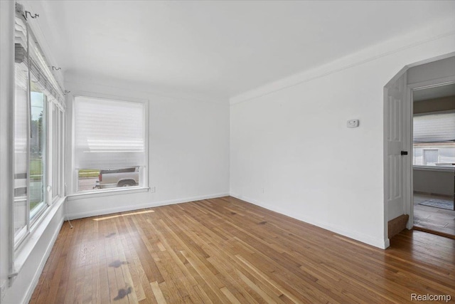 20401 Anglin St, Detroit, MI 48234 - unfurnished room featuring hardwood / wood-style floors and arched walkways