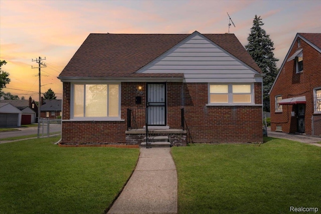 20401 Anglin St, Detroit, MI 48234 - bungalow-style house featuring a lawn and brick siding
