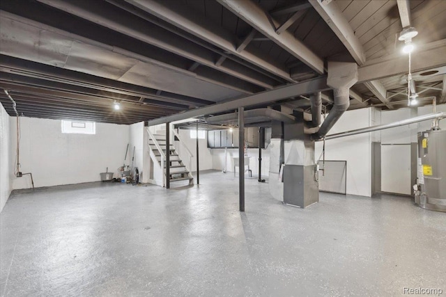 20401 Anglin St, Detroit, MI 48234 - basement with water heater, heating unit, and stairs