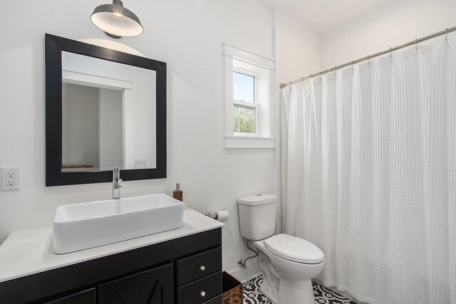 7285 Maple St, South Haven, MI 49090 - bathroom featuring vanity and toilet