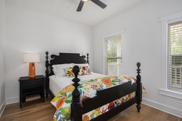7285 Maple St, South Haven, MI 49090 - bedroom with wood finished floors and ceiling fan