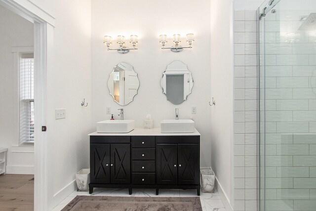 7285 Maple St, South Haven, MI 49090 - bathroom with double vanity and tiled shower