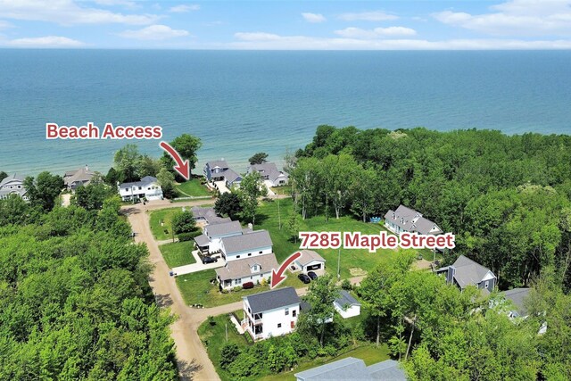 7285 Maple St, South Haven, MI 49090 - aerial view of residential area featuring a nearby body of water