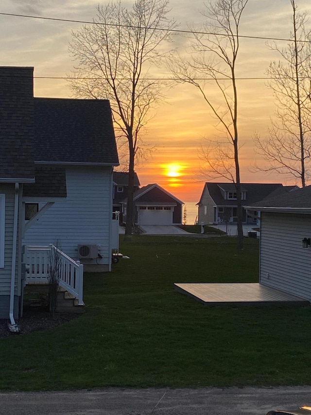 7285 Maple St, South Haven, MI 49090 - yard at dusk with a yard