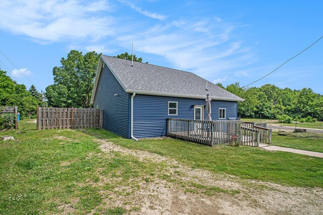 2813 Bond St, Niles, MI 49120 - rear view of property with a shingled roof and a wooden deck