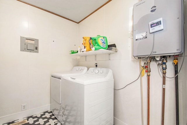 2813 Bond St, Niles, MI 49120 - laundry area featuring tankless water heater, crown molding, washing machine and dryer, and tile patterned floors