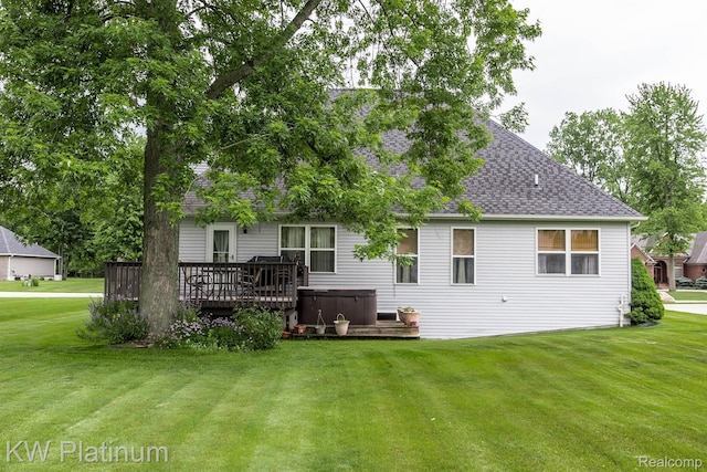 3167 Blackheath Ct, Port Huron, MI 48060 - rear view of property featuring a hot tub, a shingled roof, a deck, and a yard