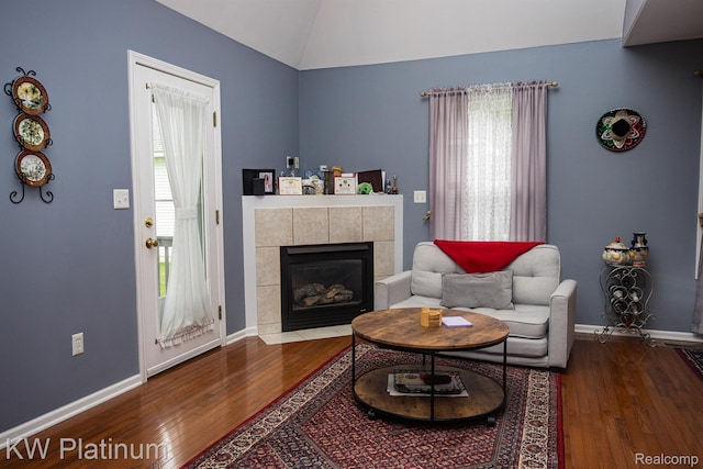 3167 Blackheath Ct, Port Huron, MI 48060 - living room featuring wood-type flooring, a fireplace, and lofted ceiling