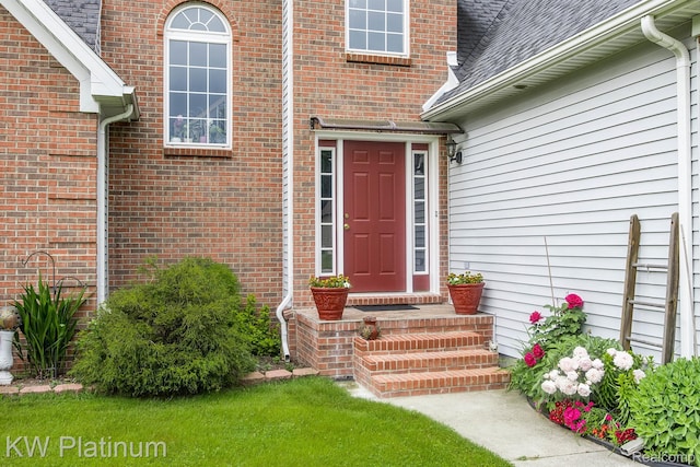 3167 Blackheath Ct, Port Huron, MI 48060 - doorway to property featuring roof with shingles and brick siding