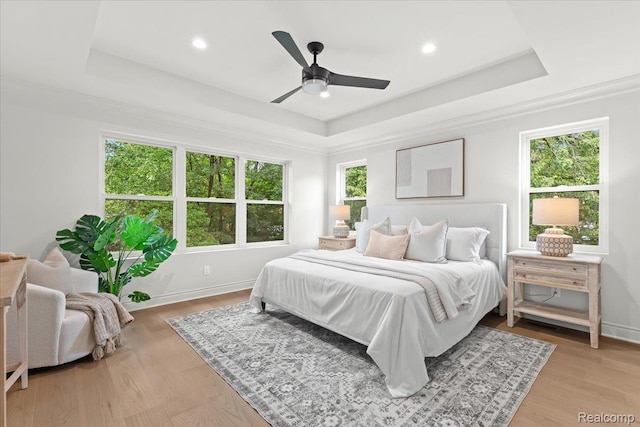 624 S Vermont Ave, Royal Oak, MI 48067 - bedroom with a raised ceiling, light wood finished floors, recessed lighting, and a ceiling fan