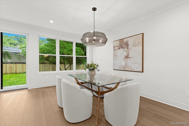 624 S Vermont Ave, Royal Oak, MI 48067 - dining area with a chandelier, ornamental molding, wood finished floors, and recessed lighting