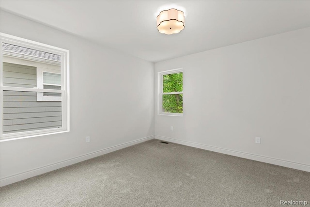 624 S Vermont Ave, Royal Oak, MI 48067 - carpeted empty room featuring baseboards