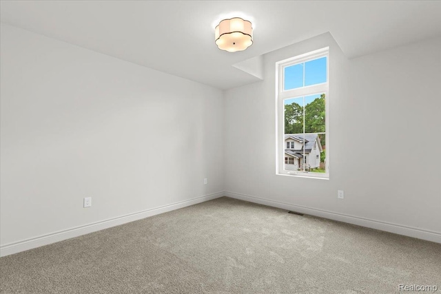 624 S Vermont Ave, Royal Oak, MI 48067 - unfurnished room with carpet floors and baseboards