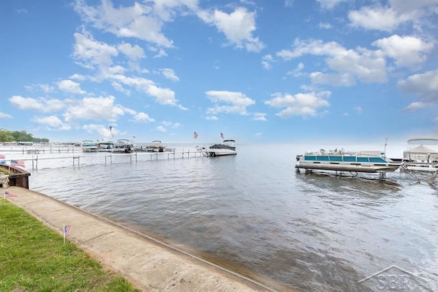 6276 W Houghton Lake Dr, Houghton Lake, MI 48629 - dock area featuring a water view