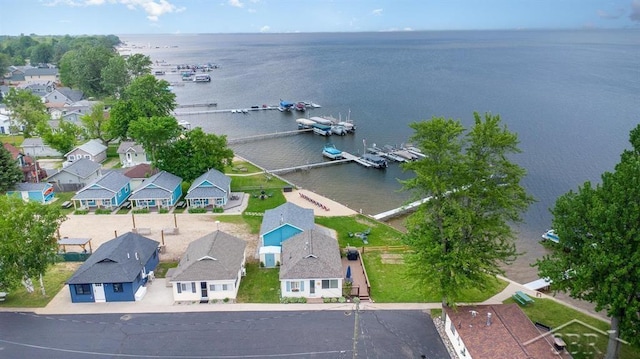 6276 W Houghton Lake Dr, Houghton Lake, MI 48629 - aerial view of residential area featuring a nearby body of water