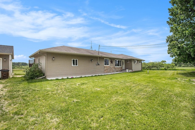 3463 Arthur Rd, Remus, MI 49340 - rear view of property featuring a yard