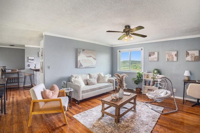 3463 Arthur Rd, Remus, MI 49340 - living area with crown molding, a ceiling fan, a textured ceiling, and hardwood / wood-style flooring
