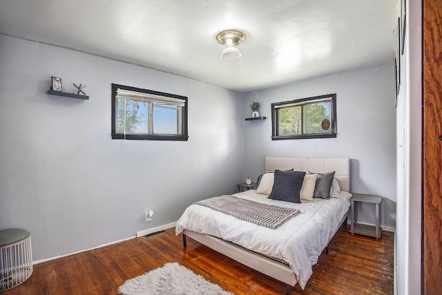 3463 Arthur Rd, Remus, MI 49340 - bedroom featuring wood finished floors and baseboards