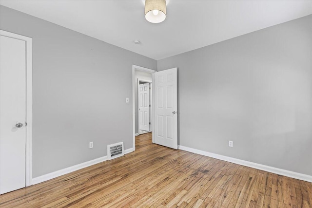 22406 Colony St, Saint Clair Shores, MI 48080 - unfurnished room featuring wood finished floors and a smoke detector