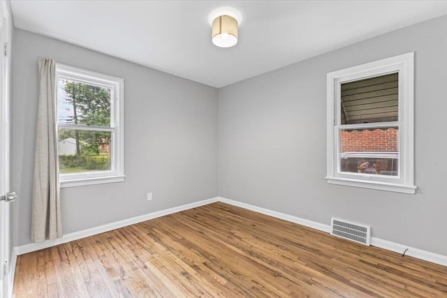 22406 Colony St, Saint Clair Shores, MI 48080 - spare room featuring baseboards and wood finished floors