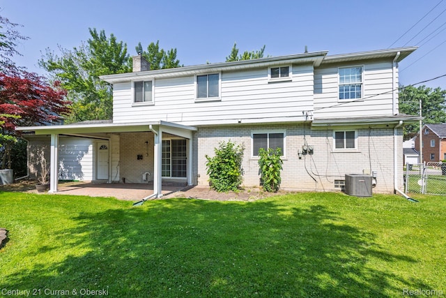 20740 Marter Rd, Grosse Pointe Woods, MI 48236 - back of property featuring a patio, a chimney, and brick siding