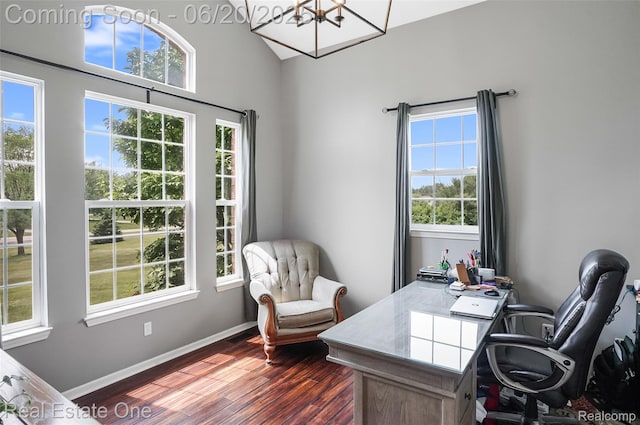 9806 Goldfinch Ct, Saline, MI 48176 - home office featuring dark wood finished floors and a chandelier