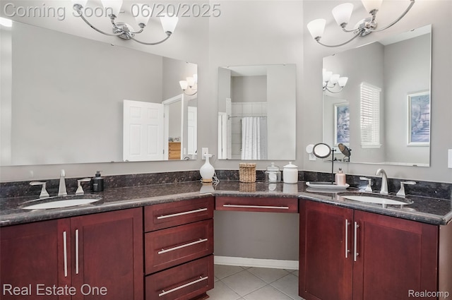 9806 Goldfinch Ct, Saline, MI 48176 - full bathroom with a chandelier, double vanity, and tile patterned floors