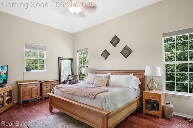 9806 Goldfinch Ct, Saline, MI 48176 - bedroom with dark wood-type flooring and baseboards