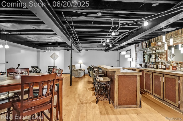 9806 Goldfinch Ct, Saline, MI 48176 - indoor bar featuring light wood-style flooring